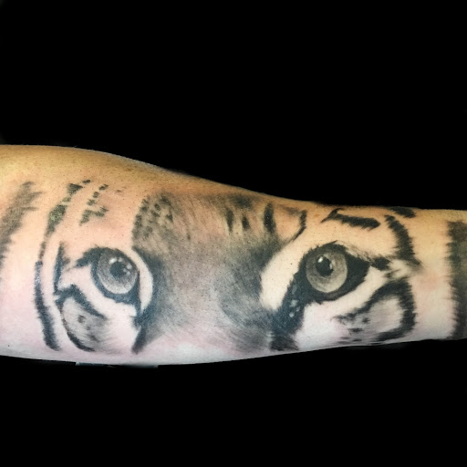 Explore inner bicep tattoo cover up ideas, creative tattoo ideas in Sioux Falls, available at Starry Eyed Studio