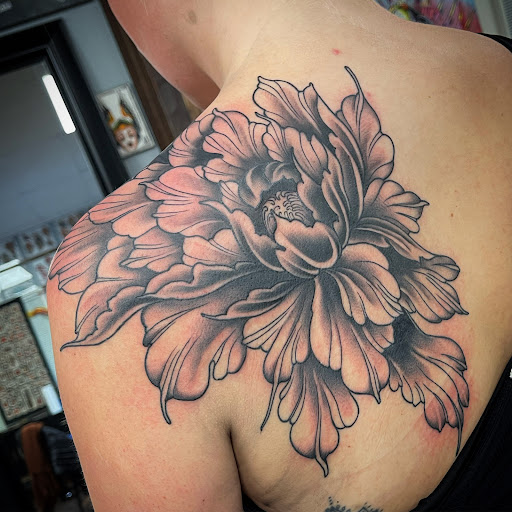 Explore diving tattoo ideas, creative tattoo ideas in Chatham, available at DMC Tattoo