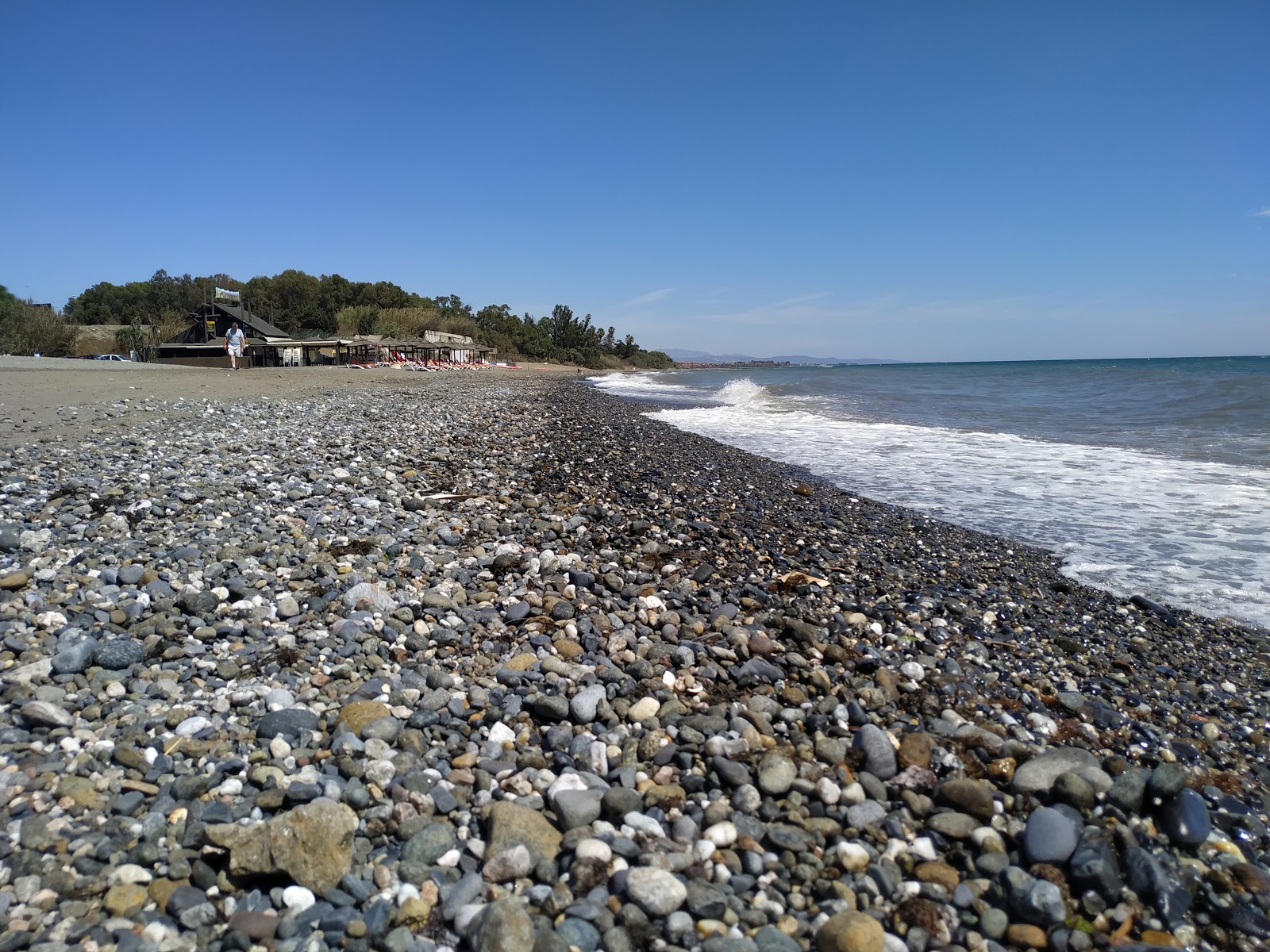Foto di Playa del Padron con una superficie del sabbia grigia