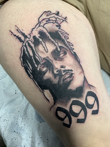 Explore pulp fiction tattoo ideas, creative tattoo ideas in Buffalo, available at True Gloom Tattoo Studio