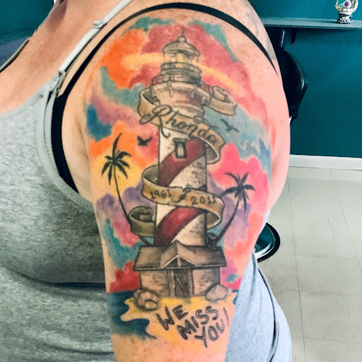 Explore vertical tattoo ideas, creative tattoo ideas in Homosassa, available at Citrus Tattoos