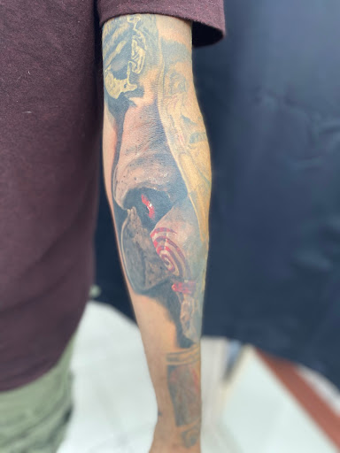 Explore feminist tattoo ideas, creative tattoo ideas in Sparks, available at Tidal Wave Tattoo