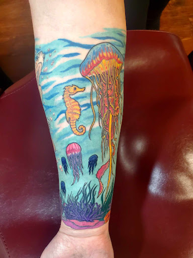 Explore wwe tattoo ideas, creative tattoo ideas in Independence, available at Odins Mark Tattoo and Emporium