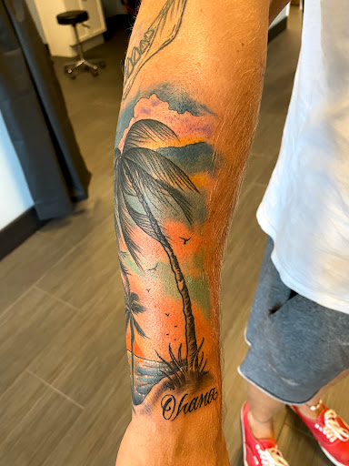 Explore upper back tattoo ideas for guys, creative tattoo ideas in Palm Harbor, available at Angry Owl Tattoo and Piercing