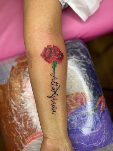 Explore fist tattoo ideas, creative tattoo ideas in Tehachapi, available at Briar Rose TATTOO