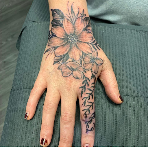 Explore guy wrist tattoo ideas, creative tattoo ideas in Orange Park, available at Big City Tattoo and Piercing