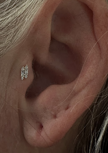 Explore tattoo ideas rib cage, creative tattoo ideas in Roseville, available at Ravens Mark Body Art Collective Tattoos & Piercings