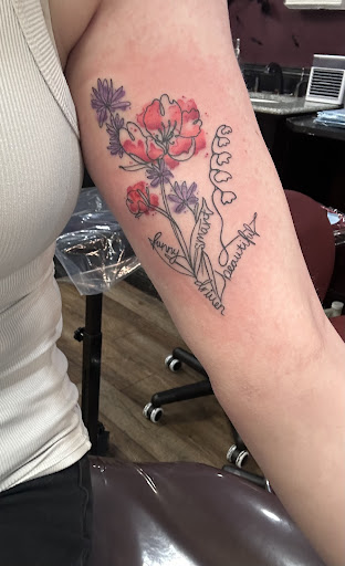 Explore half sleeve tattoo ideas with meaning, creative tattoo ideas in Clarksville, available at Dark Raine Tattoo