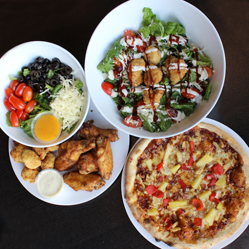 #5 best pizza place in Katy - 1000 Degrees Pizza Salad Wings