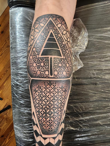 Explore tattoo connection ideas, creative tattoo ideas in Chapel Hill, available at Golden Falcon Tattoo and Piercing
