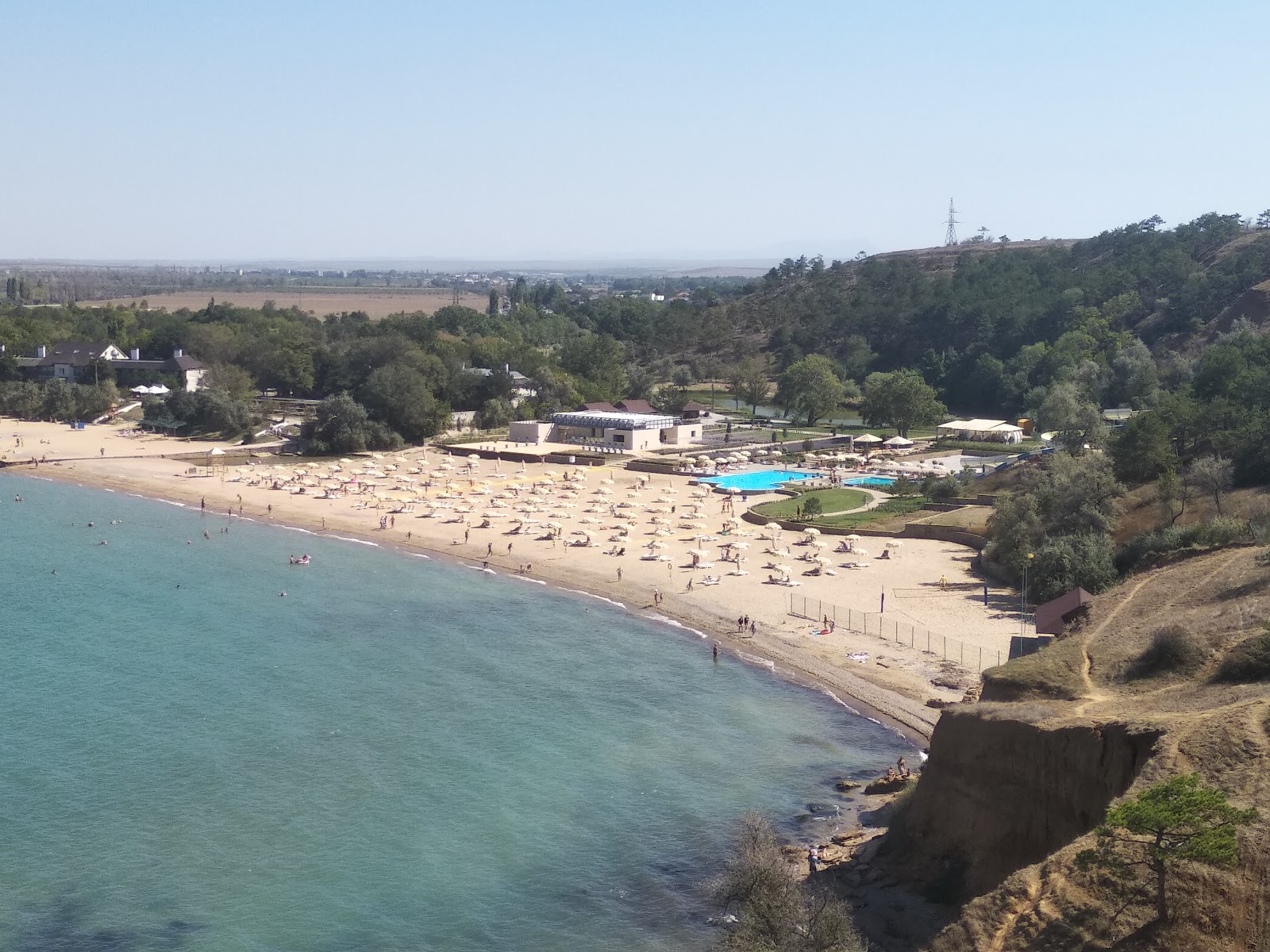 Foto de Sandy beach con cala pequeña