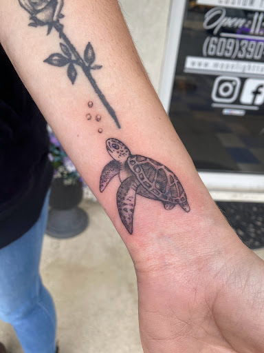 Explore eye tattoo ideas for guys, creative tattoo ideas in Ocean View, available at Moonlight Tattoo