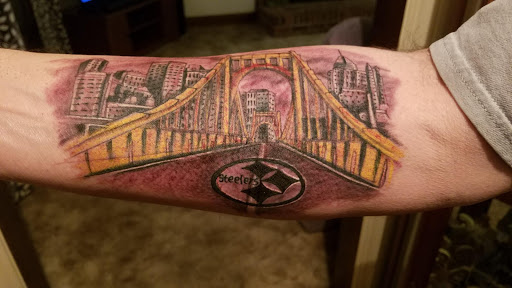 Explore tattoo ideas arm sleeve, creative tattoo ideas in Wilson, available at New Addiction Tattoos