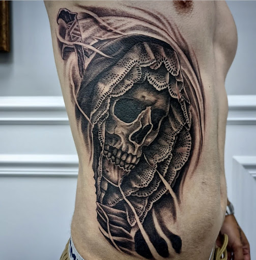 Explore back of arm tattoo ideas, creative tattoo ideas in Warrenville, available at UpRise Tattoos
