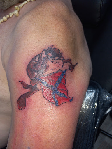 Explore full neck tattoo ideas, creative tattoo ideas in Hamilton, available at Black Dagger Tattoo Co.