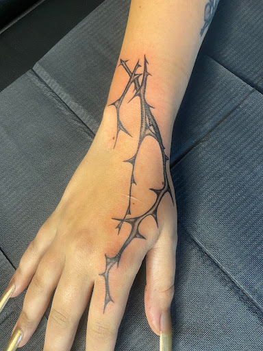 Explore climbing tattoo ideas, creative tattoo ideas in Prescott, available at Bold as Love Tattoo and Piercing Studio