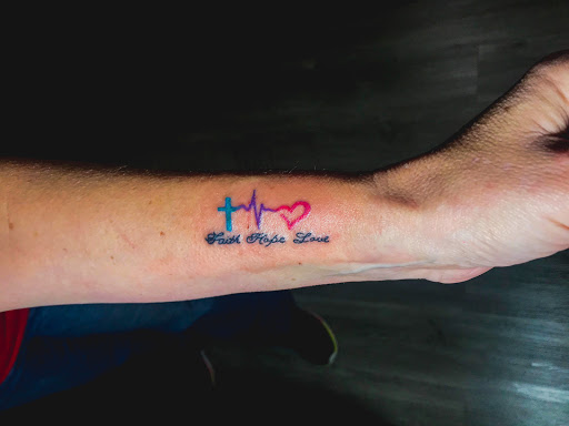 Explore colorful flower tattoo ideas, creative tattoo ideas in Bowling Green, available at Ink Therapy and Body Piercing