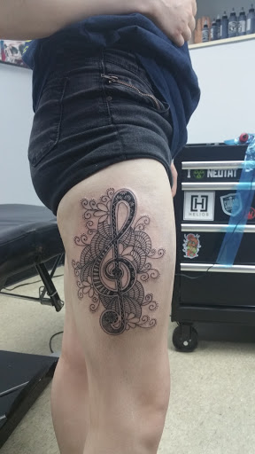 Tattoo Shop «Revolt Tattoo Studio», reviews and photos, 505 S Neil St #10, Champaign, IL 61820, USA