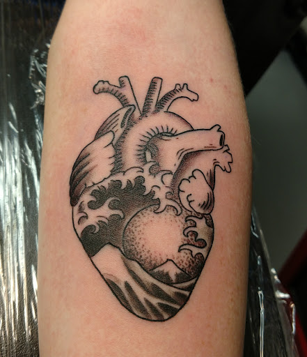 Explore mens forearm tattoo ideas, creative tattoo ideas in Marietta, available at Monkeys Uncle Tattoo