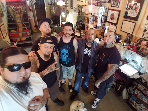 Explore dad son tattoo ideas, creative tattoo ideas in Los Angeles, available at Tinta Rebelde hardcore tattoo