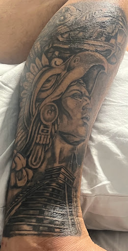 Explore semicolon tattoo ideas for men, creative tattoo ideas in Osage Beach, available at Lake Ozark Tattoo and Hair Studio