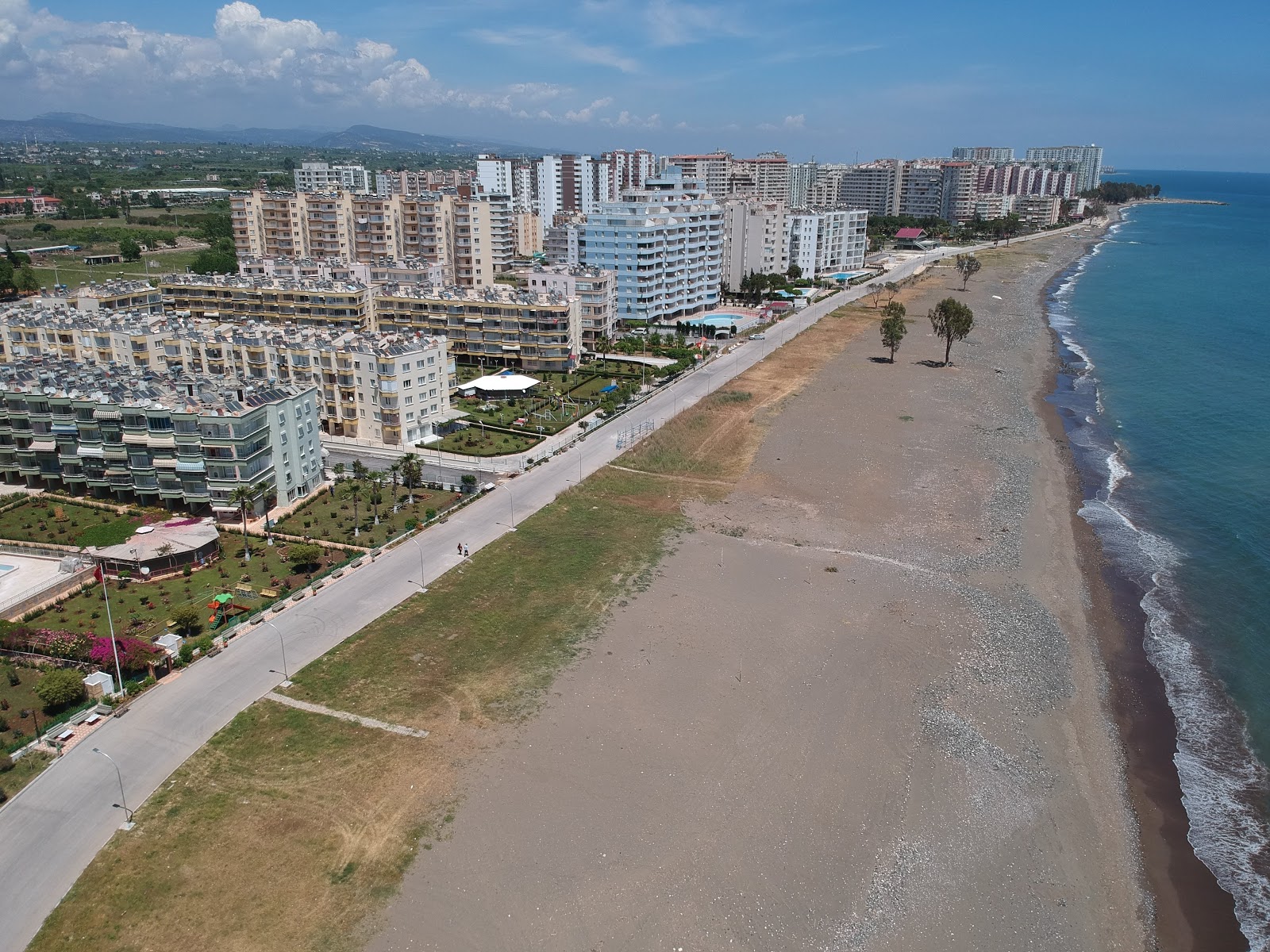 Photo of Arpacbahsis beach and the settlement