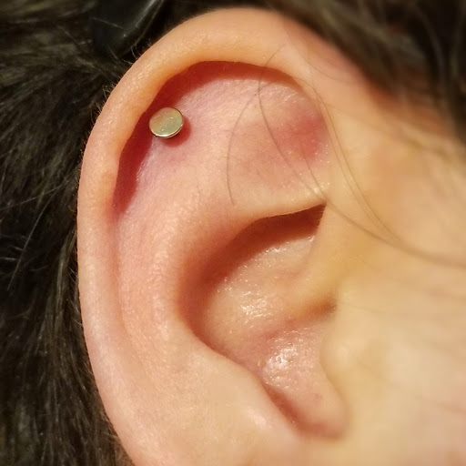 Explore small back tattoo ideas, creative tattoo ideas in Ocoee, available at Slaughterized Ink Tattoo and Piercing Studio