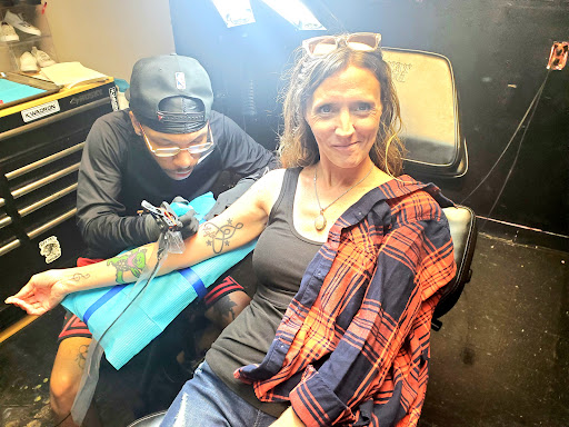Explore opossum tattoo ideas, creative tattoo ideas in Greer, available at Inkslingers Electric Tattooing