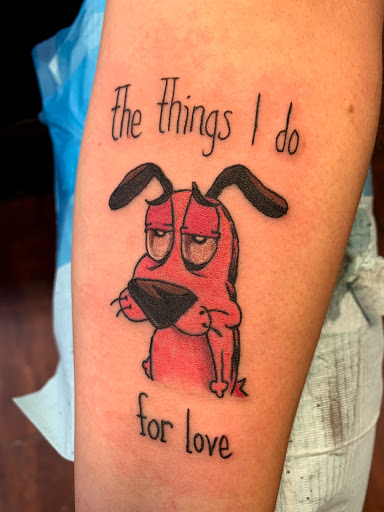 Explore dog tattoo ideas for females, creative tattoo ideas in Seymour, available at American Gypsy Tattoo Corp.