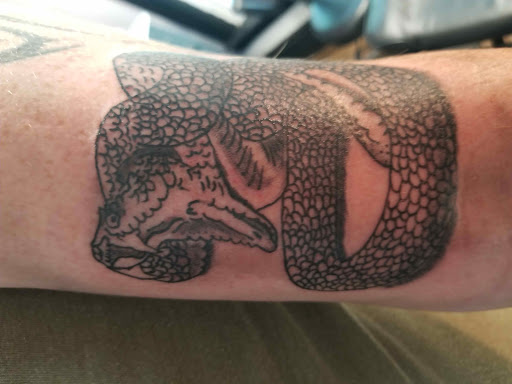 Explore red tattoo cover up ideas, creative tattoo ideas in Arcade, available at 98 South Tattoo and Piercing