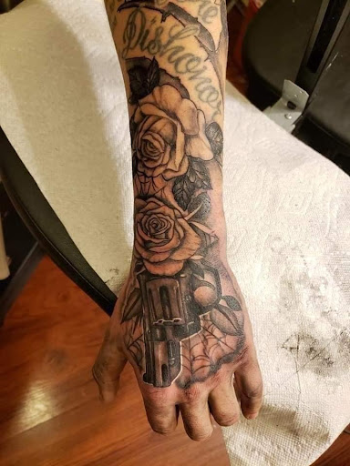 Find tattoo ideas of roses for your next unique tattoo in Puyallup at Get Right Studios