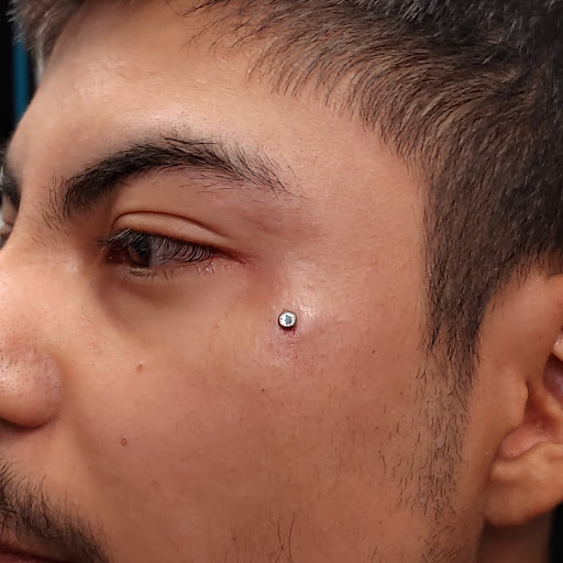 Explore hisoka tattoo ideas, creative tattoo ideas in San Marcos, available at Ollie the Impaler Body Piercing