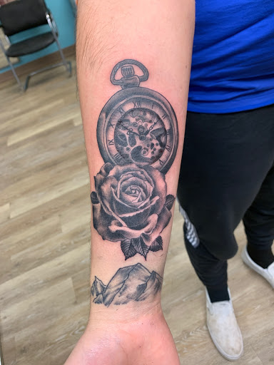 Explore spine tattoo ideas for women, creative tattoo ideas in Houghton Lake, available at Screaming Eagle Tattoo
