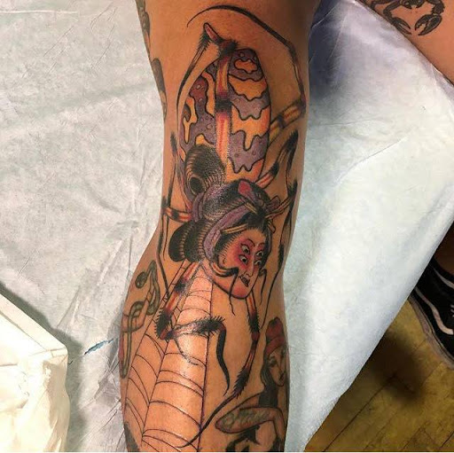 Explore tattoo ideas on calf, creative tattoo ideas in Albany, available at Dead Presidents Lounge