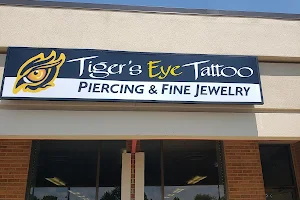 Tiger's Eye Tattoo Piercing & Fine Jewelry image