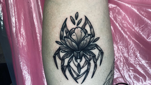 Explore cute foot tattoo ideas, creative tattoo ideas in Lake City, available at Crooked Spines Tattoo Studio