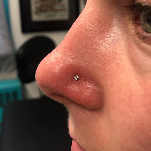 Explore hammer tattoo ideas, creative tattoo ideas in West Chester, available at Piercing by Jacqueline at X-Treme Ink Tattoo