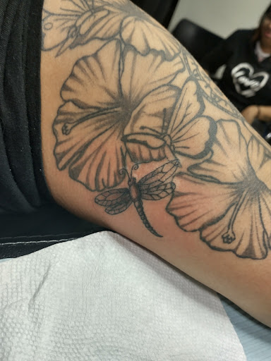 Explore sunflower sleeve tattoo ideas, creative tattoo ideas in Carbondale, available at MsCandyTattoo