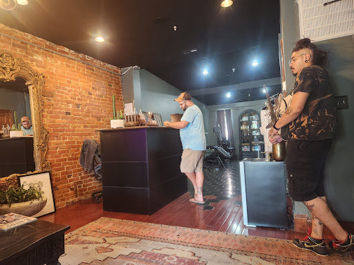 Explore dark tattoo cover up ideas, creative tattoo ideas in Washington, available at Trilogy Atelier - DC Tattoo Shop Piercing Studio