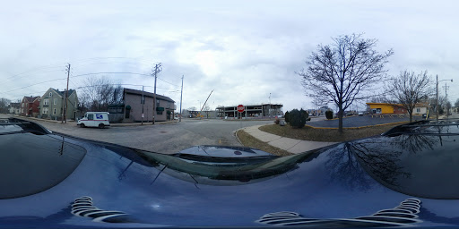 Explore dog collar tattoo ideas, creative tattoo ideas in Milwaukee, available at Bay Street Tattoo Co.