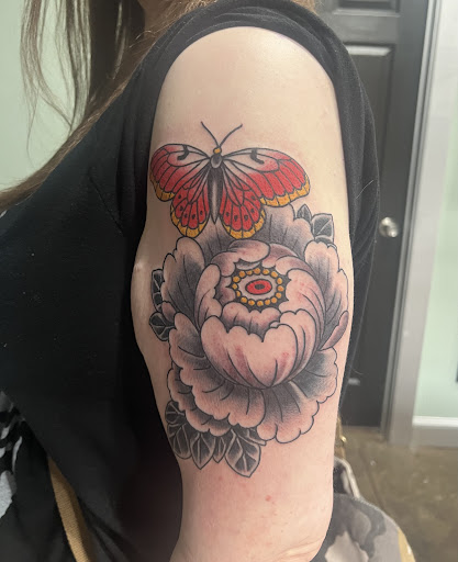 Explore money tattoo ideas, creative tattoo ideas in Plano, available at Legend Tattoo & Piercing Shop