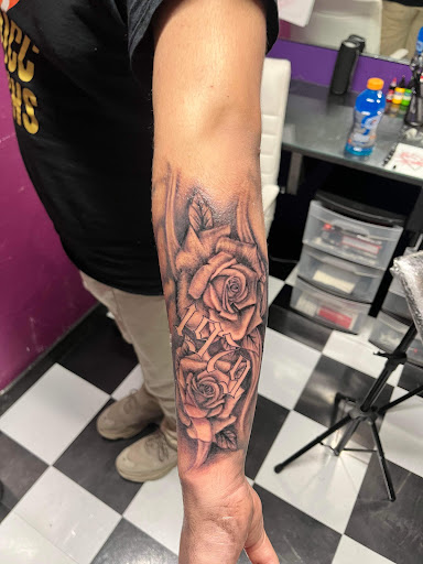 Explore sleeve tattoo fill in ideas, creative tattoo ideas in Corpus Christi, available at Purple Ink - Tattoo & Piercing Studio