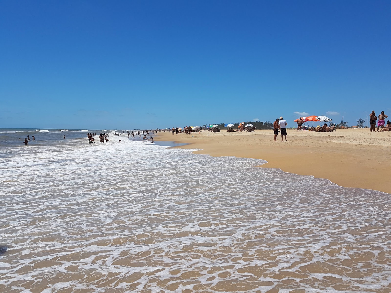 Foto af Grussai Strand med lys sand overflade