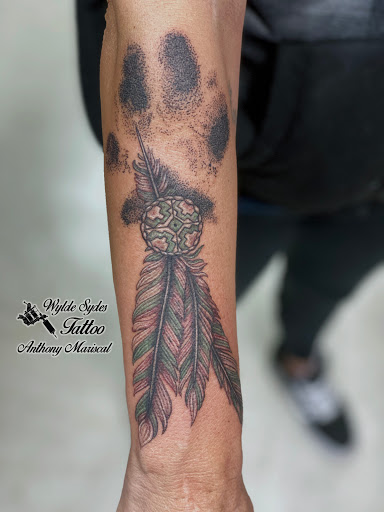 Explore simple dog tattoo ideas, creative tattoo ideas in San Diego, available at Wylde Sydes Tattoo & Body Piercing