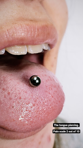 Explore mf doom tattoo ideas, creative tattoo ideas in Modesto, available at MyRadiantBody - Piercing in Modesto