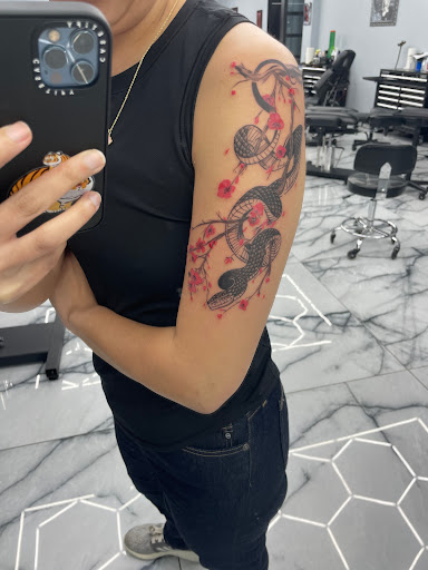 Explore sunflower and butterfly tattoo ideas, creative tattoo ideas in Rowlett, available at Sinners Tattoo Studio and Supply
