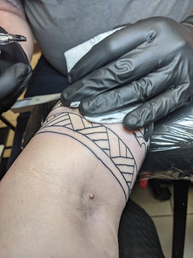 Find surrealism tattoo ideas for your next unique tattoo in Lawrence at Skin Illustrations Tattoos & Piercings