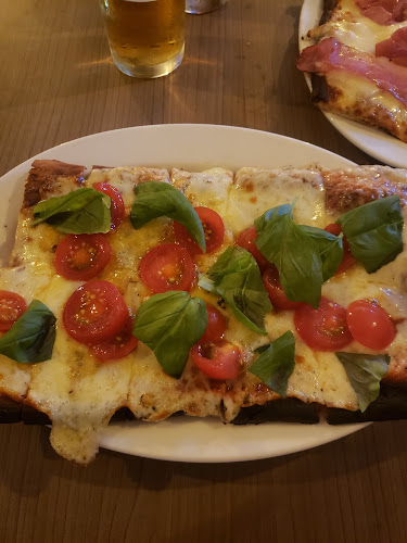 Opiniones de Pizzería Rústica en Las Piedras - Restaurante