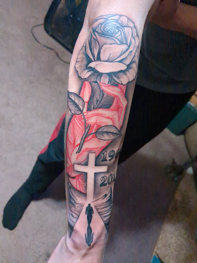 Explore partial sleeve tattoo ideas, creative tattoo ideas in Owosso, available at Expressions Body Art Studio