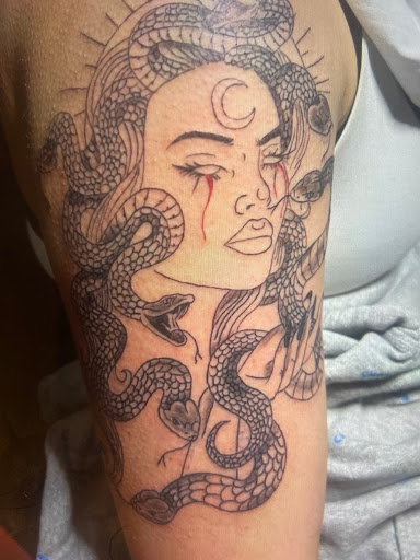 Explore tattoo back cover up ideas, creative tattoo ideas in Middletown, available at Schuchiis Ink